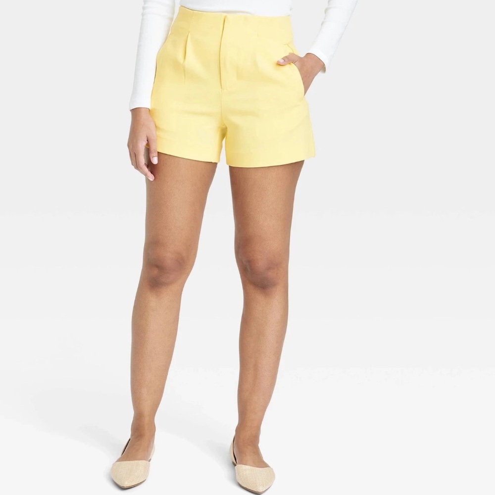 A New Day high-rise tailored midi shorts in yellow. Size 10